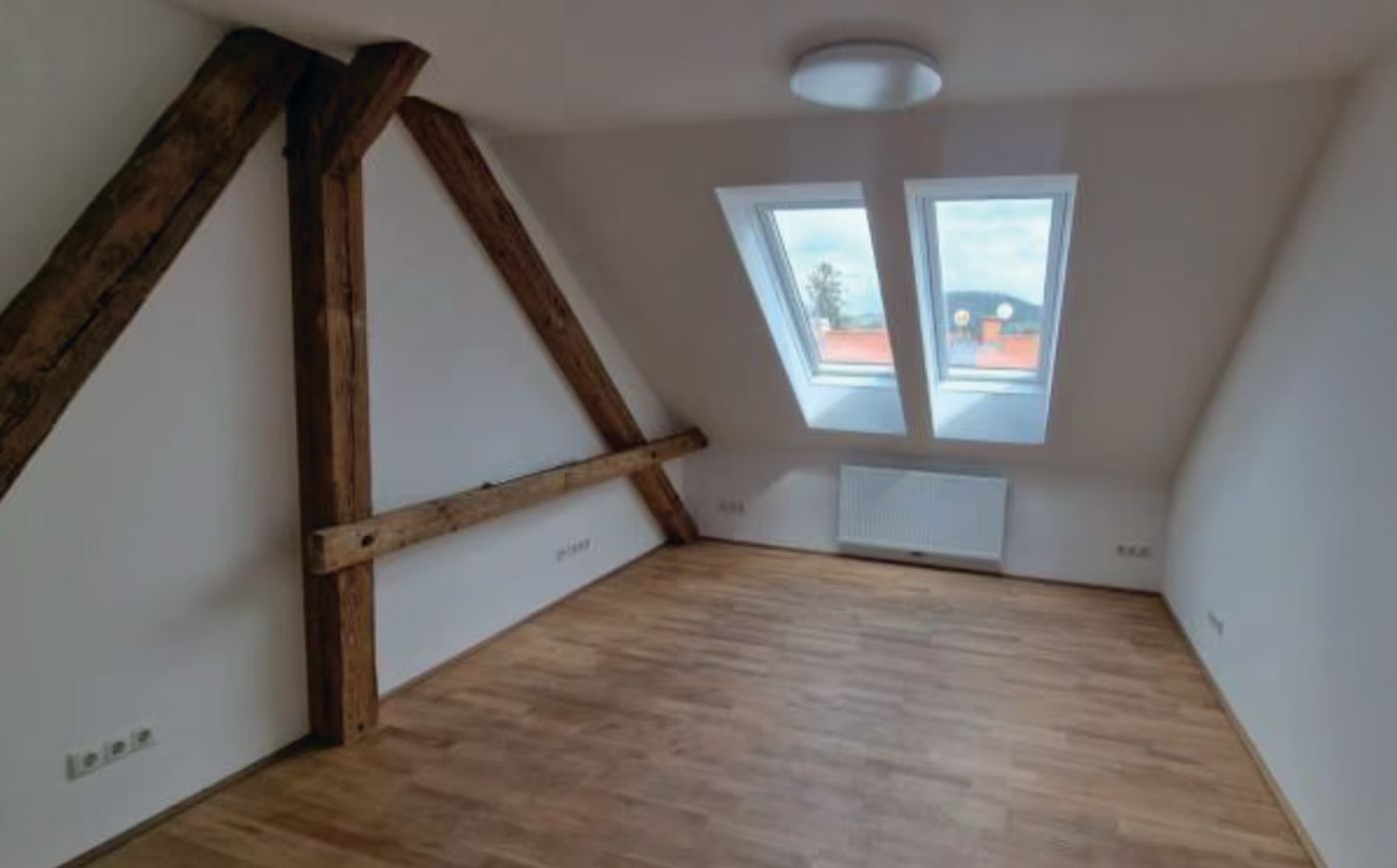 Dachbodenausbau in einem Grazer Zinshaus